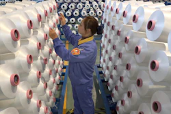 An employee works in a chemical fiber plant in Nantong, China, Jan. 17, 2020.