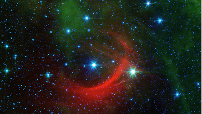 Runaway star Kappa Cassiopeiae, or HD 2905, and its bow shock captured by the Spitzer Space Telescope.