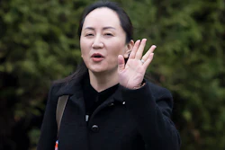 Meng Wanzhou, chief financial officer of Huawei, leaves her home in Vancouver, January, 20, 2020.