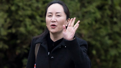 Meng Wanzhou, chief financial officer of Huawei, leaves her home in Vancouver, January, 20, 2020.
