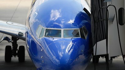 In this Sept. 9, 2019, file photo, Southwest pilots prepare for a flight at Tampa International Airport in Tampa, Fla.