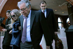 Insys Therapeutics founder John Kapoor, front, departs federal court, Jan. 23, 2020, in Boston.