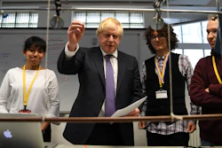 Prime Minister Boris Johnson, center left, visits the Department of Mathematics at King's Maths School, London, Jan. 27, 2020.