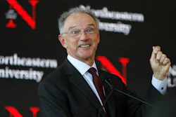 David Roux speaks at a news conference to announce his investment in Northeastern University to establish a graduate school and research center in Portland, Maine, Jan. 27, 2020.