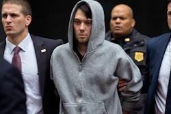 In this Dec. 17, 2015, file photo, Martin Shkreli is escorted by law enforcement agents in New York.