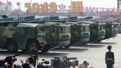 Military vehicles during the parade to commemorate the 70th anniversary of the founding of Communist China in Beijing, Oct. 1, 2019.
