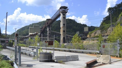 In this Aug. 31, 2016, photo, a coal mine owned by West Virginia then-gubernatorial candidate Jim Justice sits idle near Hindman, Ky.