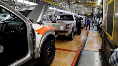 Ford F-150 trucks assembled at the Ford Rouge assembly plant in Dearborn, Mich., Sept. 27, 2018.