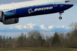 A Boeing 777X airplane takes off on its first flight at Paine Field in Everett, Wash., Jan. 25, 2020.