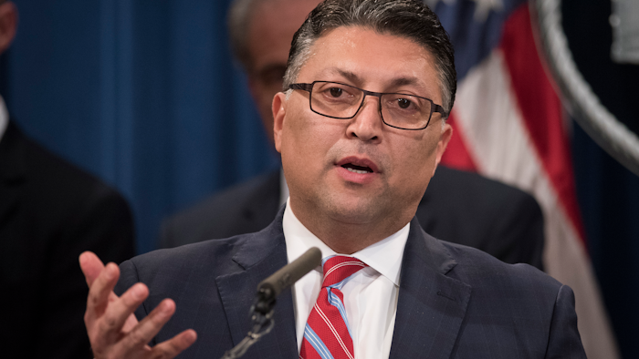 Assistant Attorney General Makan Delrahim speaks at the Justice Department in Washington, Nov. 5, 2019.