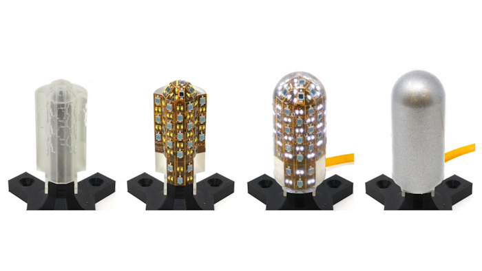 Tactile fingers in manufacturing stages: 3D-printed skeleton, flexible circuit board, transparent silicone layer, and reflective skin.