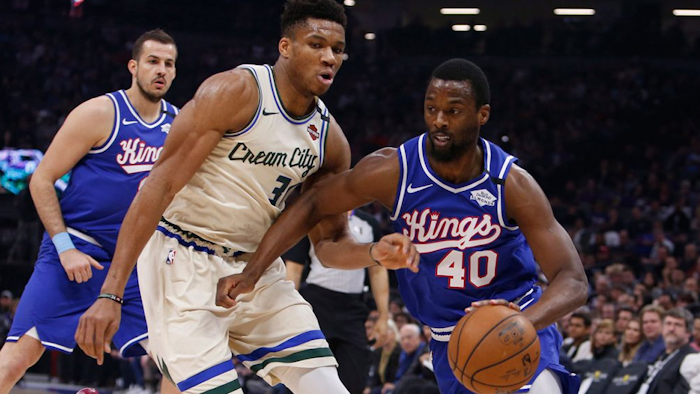 Sacramento Kings forward Harrison Barnes drives against Milwaukee Bucks forward Giannis Antetokounmpo, Jan. 10, 2020.