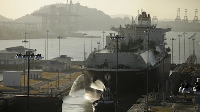 A ship guided through the Cocoli locks of the expanded Panama Canal, Jan. 19, 2017.