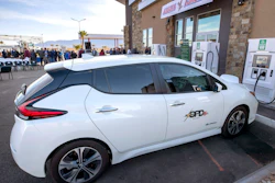 A Nissan Leaf electric vehicle charges at the Eagle's Landing Travel Plaza, Mesquite, Nev., Jan. 29, 2020.