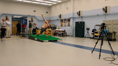 Central Connecticut pitcher Michael DeLease throws off a smart mound at the Center for Motion Analysis in Farmington, Conn., Jan. 28, 2020.