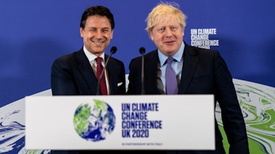 British Prime Minister Boris Johnson, right, and Italian Prime Minister Giuseppe Conte attend the launch of the upcoming COP26 UN Climate Summit in London, Feb. 4, 2020.