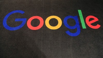 Google logo on a carpet at the entrance of Google France in Paris, Nov. 18, 2019.