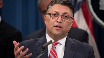 Assistant Attorney General Makan Delrahim speaks at the Justice Department in Washington, Nov. 5, 2019.