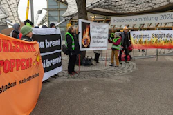 Climate activists demonstrate outside the Olympic Hall during Siemens' annual shareholders' meeting in Munich, Feb. 5, 2020.