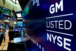 In this April 23, 2018, file photo, the logo for General Motors appears above a trading post on the floor of the New York Stock Exchange.