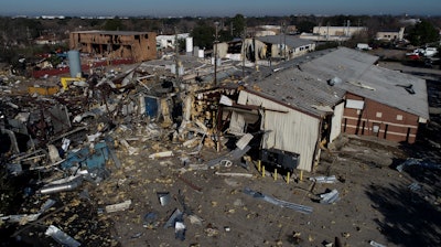This Jan. 24, 2020, file aerial photo shows the scene of an explosion in northwest Houston.
