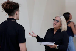 In this Oct. 1, 2019, file photo, Gory Rodriguez of Starbucks, right, interviews a job applicant during a job fair at Dolphin Mall in Miami
