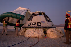 Boeing, NASA and U.S. Army personnel work around the Boeing Starliner spacecraft shortly after it landed in White Sands, N.M., Dec. 22, 2019.