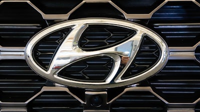 Logo on a 2019 Hyundai Santa Fe SUV at the Pittsburgh International Auto Show, Feb. 14, 2019.