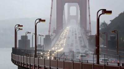 Traffic crosses the Golden Gate Bridge in Sausalito, Calif., Jan. 5, 2016.