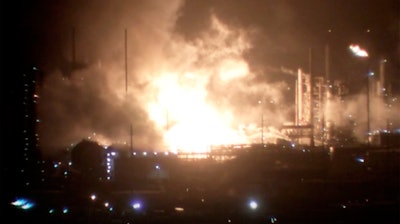 Fire inside the refinery early in Baton Rouge, La., Feb. 12, 2020.