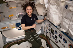 Astronaut Christina Koch in the vestibule between a SpaceX Dragon cargo craft and the Harmony module of the International Space Station, June 2019.