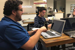 Energy industry software specialist Ryan Mohrman, left, information system developer Ariel Lasry, center, and coder Kelsi Hoyle at a Code For Denver meeting in Denver, Jan. 13, 2020.