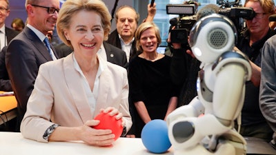 President of the European Commission Ursula von der Leyen with the 'Do you Speak Robot?' at the VUB in Brussels, Feb. 18. 2020.