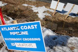 Signs mark the route of the Atlantic Coast Pipeline in Deerfield, Va., Feb. 8, 2018.