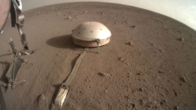 The InSight lander's dome-covered seismometer, known as SEIS, on Mars, Feb. 18, 2020.