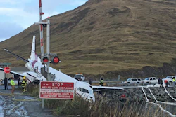 This Oct. 17, 2019, file photo shows a commuter airplane that crashed near the airport in Unalaska, Alaska, killing a passenger.