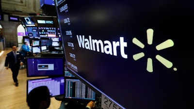 Walmart logo above a trading post at the New York Stock Exchange, Feb. 18, 2020.