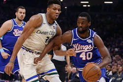 Sacramento Kings forward Harrison Barnes drives against Milwaukee Bucks forward Giannis Antetokounmpo, Jan. 10, 2020.