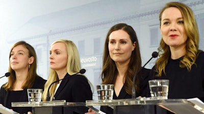 From left, Finnish Minister of Education Li Andersson, Minister of Interior Maria Ohisalo, Prime Minister Sanna Marin and Minister of Finance Katri Kulmuni at a news conference in Helsinki, Dec. 10, 2019.