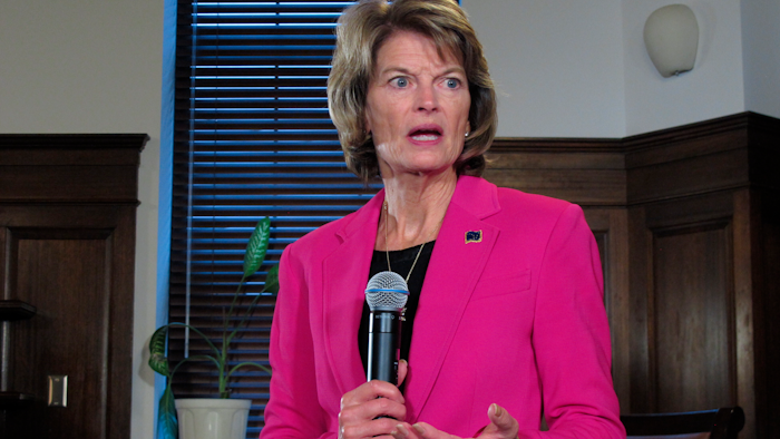 U.S. Sen. Lisa Murkowski speaks with reporters after a speech to the Alaska Legislature in Juneau, Feb. 18, 2020.