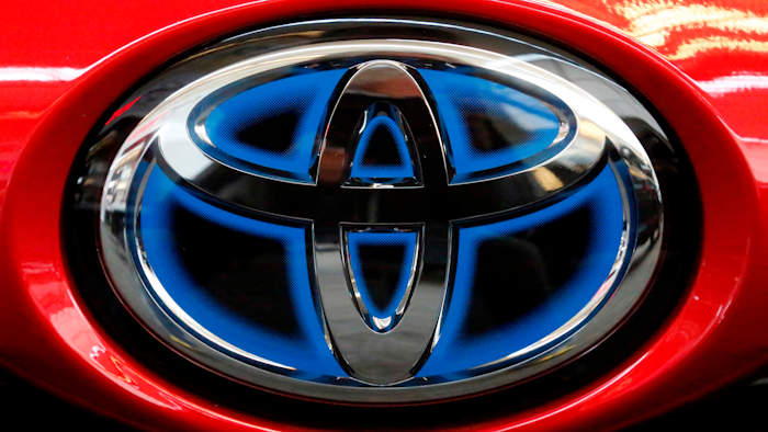 Toyota logo on the trunk of a 2018 Prius at the Pittsburgh Auto Show, Feb. 15, 2018.