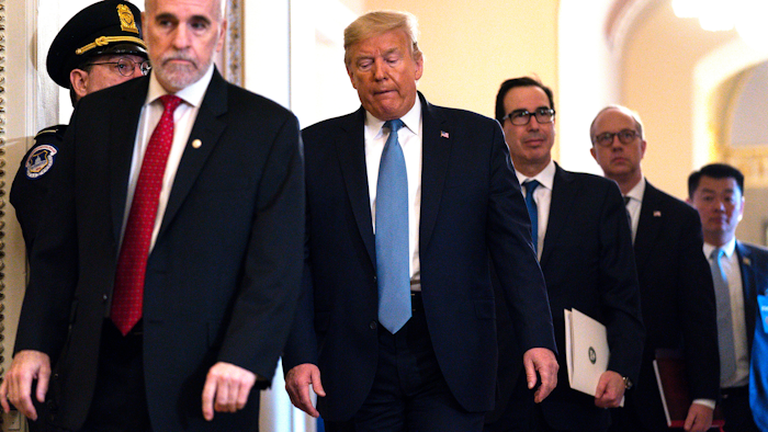 President Donald Trump leaves a meeting with Republican lawmakers on Capitol Hill, March 10, 2020.