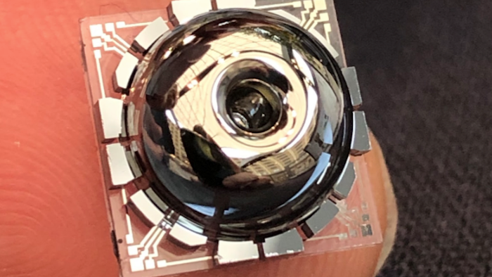 New resonator and electrodes shown on a finger for scale.