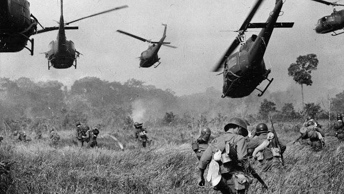 U.S. Army helicopters cover the advance of ground troops near the Cambodian border, March 1965.