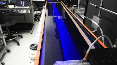 This 1.5-meter-long experimental setup was used to test the effectiveness of a submerged temperature sensor to charge and transmit instructions to a solar panel.