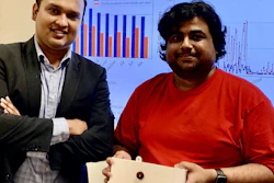 Tauhidur Rahman, left, and Forsad Al Hossain display their FluSense device.