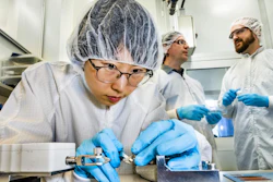 Nara Kim, with Xavier Crispin and Klas Tybrandt in the background, in the laboratory of organic electronics at Linköping University.