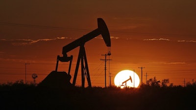 Pump jack in an oil field in the Permian Basin, Texas, June 11, 2019.