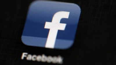 Facebook logo on an iPad in Philadelphia, May 16, 2012.