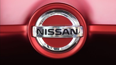 Nissan logo on a car at its showroom in Tokyo, June 14, 2018.